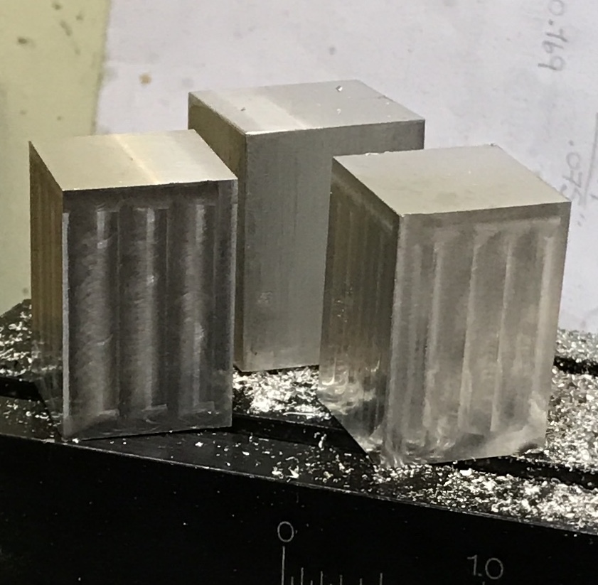 Two slider cubes milled to size